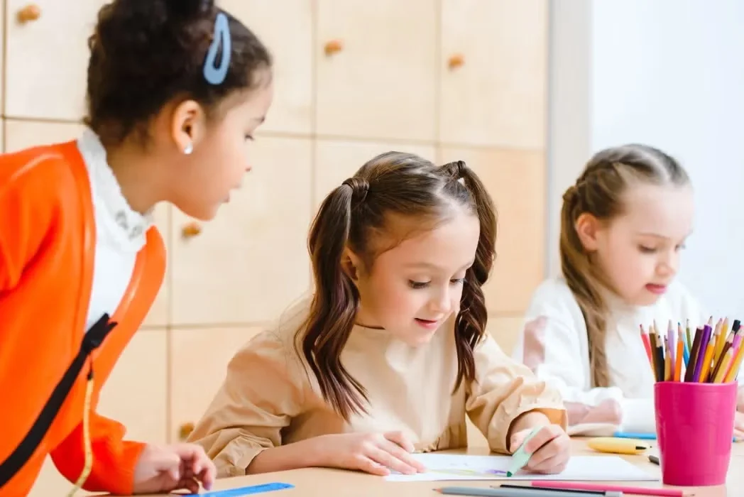 Girls working on school work