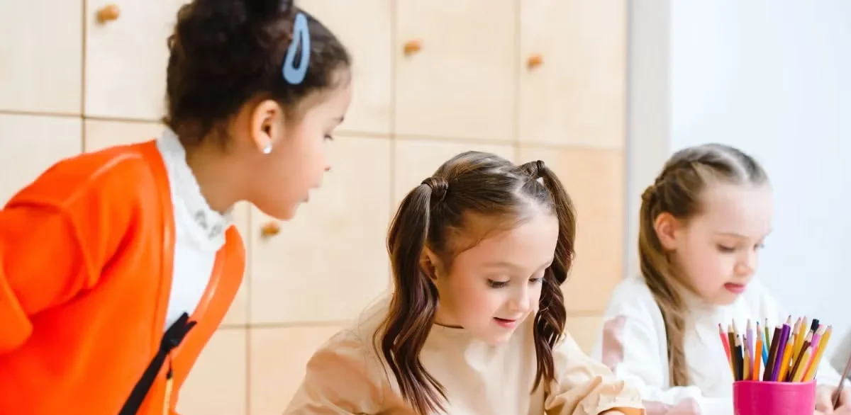 Girls working on school work